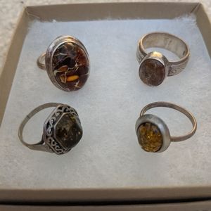 Sterling silver rings with amber and brown stones